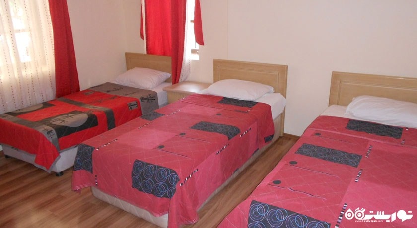 نمای تخت های اتاق تریپل